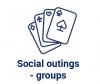 Icon of card games with words "social outings for groups"