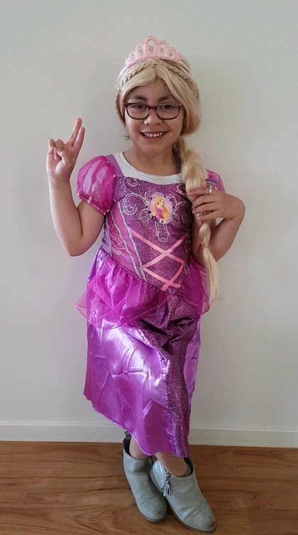 Image shows Paisley dressed as Rapunzel